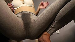 horny girl in wet leggings teasing with her curves