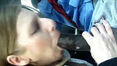 A mature woman eagerly gives a blowjob to a black man