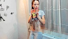 skinny mature drinking juice in homemade reality video