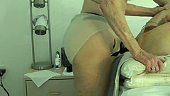 wife takes control, pegging her submissive husband in a domination session at home