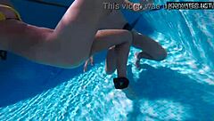 Petite Hungarian pornstar engages in intense underwater sex