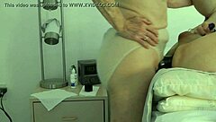 wife takes control, pegging her submissive husband in a domination session at home