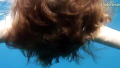 Hot ginger babe swimming underwater in Tenerife bikini scene