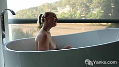 yanks sweetie kim enjoys playing in the bath tube