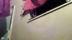 A sexy lady is spied on while using the bathroom in this voyeur video