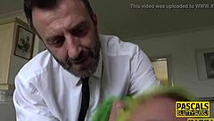 spanked tattooed submissive wears ballgag during hardcore session