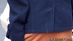 Asian teen reveals panties in public upskirt view
