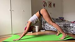 Naked Yoga Session Reveals Small Tits and Shaved Pussy on Athletic Body