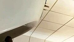 Black Gay Guy Boldly Strokes Cock At Public Urinal