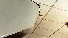 Black Gay Guy Boldly Strokes Cock At Public Urinal