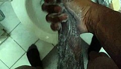 solo rubbing my big black cock with soap