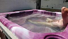 dayanara relaxing in the hot tub