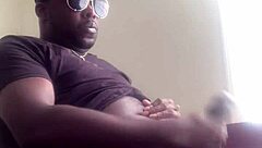 Ebony hunk masturbates with lube and cums on camera