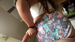 Niece tempts her uncle with short shorts in the kitchen, leading to a passionate encounter.