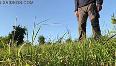 Sexy milf with huge ass in dress bends over deeply so you can see her pissing in nature