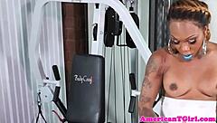 Busty ebony inked tgirl tugs her big cock