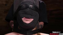 submissive undergoes bondage and caning by master