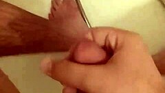 in this greek european scene, a woman gives a handjob to a guy, stroking his cock slowly at first then faster, building up to a messy cumshot.