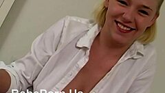 Busty young girl gives blowjob in lingerie.