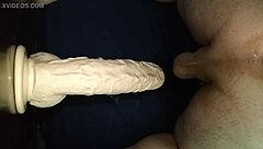 Big dildo used in gay toy play