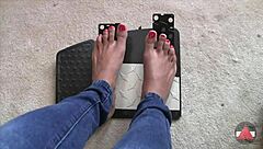 Detailed view of bare feet pumping pedals