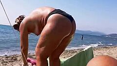 Watch this wife give blowjobs and handjobs on the beach? Her big ass and pussy are on display!