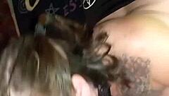 A small woman submits to rough oral sex in a wooded area
