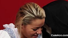 Foxy doll gets cumshot on her face in blowbang and eats all the sperm. She enjoys the cum swapping.