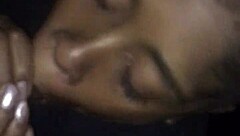 The black monster cock receives an intense blowjob