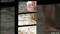 indian village bhabi bathing in the outdoor ranch, getting her big ass wet.