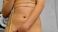 Young latina performs sexy striptease undressing to reveal tits and ass