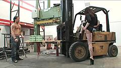 Two workers engage in a group activity with a brunette woman.