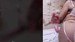 Solo brunette explores butt play with various toys