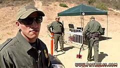 Blonde stunner performs on car hood in uniform