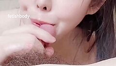 She licks balls and gives a facial blowjob