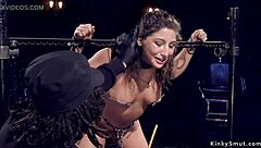 kinky brunette teen in tight bondage gets waxed and whipped in rough play.