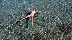 Drone captures nudist beach exhibitionism