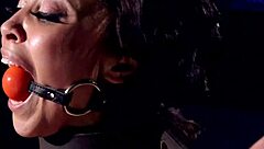 Tanned slut flogged roughly in bondage