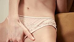 Young Blonde Babe Teases with Shaved Pussy Rub