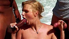 busty blonde's emotional anal threesome on beach