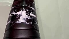 Amateur inserts anal tower dildo close up