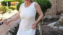 I am Mariaold, a busty milf, flashing and talking close-up