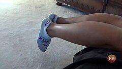 Ebony cougar fetish with puma socks on feet