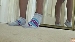 Ebony cougar fetish with puma socks on feet