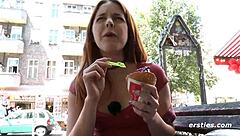 A cute babe enjoys playing outdoors in the public park.