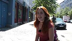 A cute babe enjoys playing outdoors in the public park.