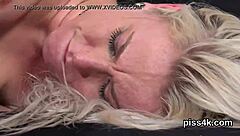 Wildly sexual lesbians are sprayed with urine and pleasure their wet vaginas with vibrators.