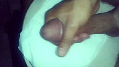 Clean-shaven man pleasures himself in the restroom