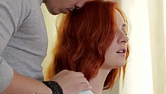scene featuring long-haired redhead with perfect body