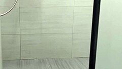 Watch MILF Undress And Touch Shaved Pussy In Shower?